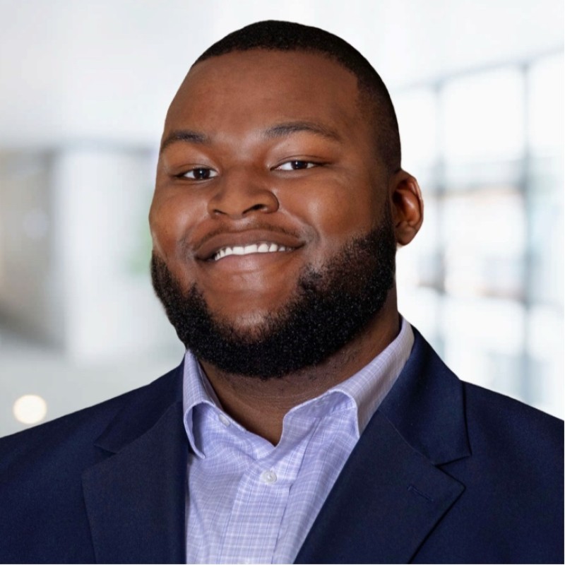 Headshot of Justin Ndupu
